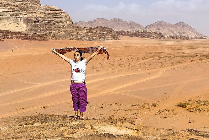 Wadi Rum Day Tour & Starlight Cave & Traditions Food - Meeting Point