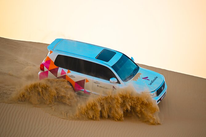 Abu Dhabi Evening Desert Safari - Dune Bashing Camel Ride and BBQ - Dining at the Camp