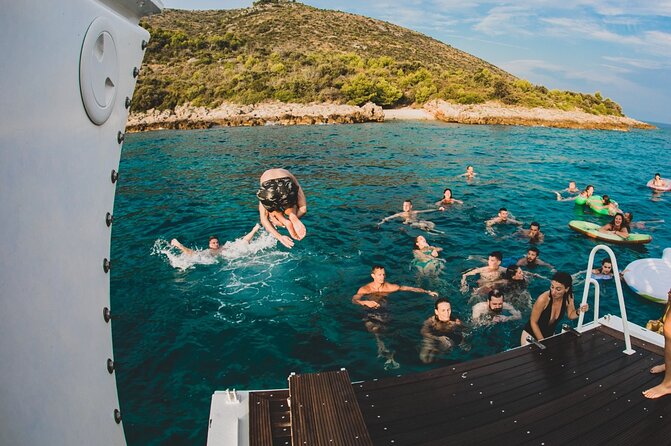 Blue Lagoon&3island Tour With St. Damian Boat - Enjoying the Waterslide