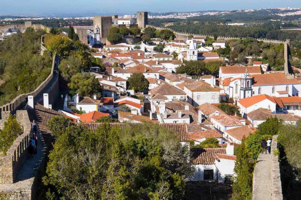 From Lisbon: Big Waves Nazare, Obidos & Batalha - Highlights of the Tour