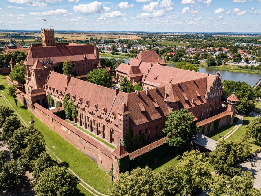 Gdansk: Malbork Castle & Westerplatte Tour With Local Lunch - Guided Experience