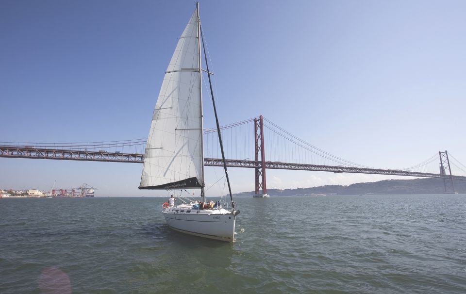 Lisbon 1H Private Tour by SAILBOAT / SAIL or POWER CATAMARAN - Luxurious Power Catamaran for 18