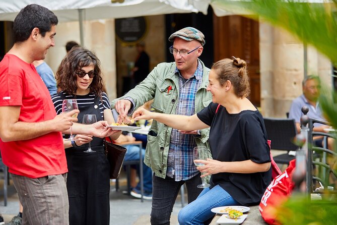 Pintxos Tasting in Bilbao Small Group or Private Walking Tour - Enjoying Pintxos and Wine