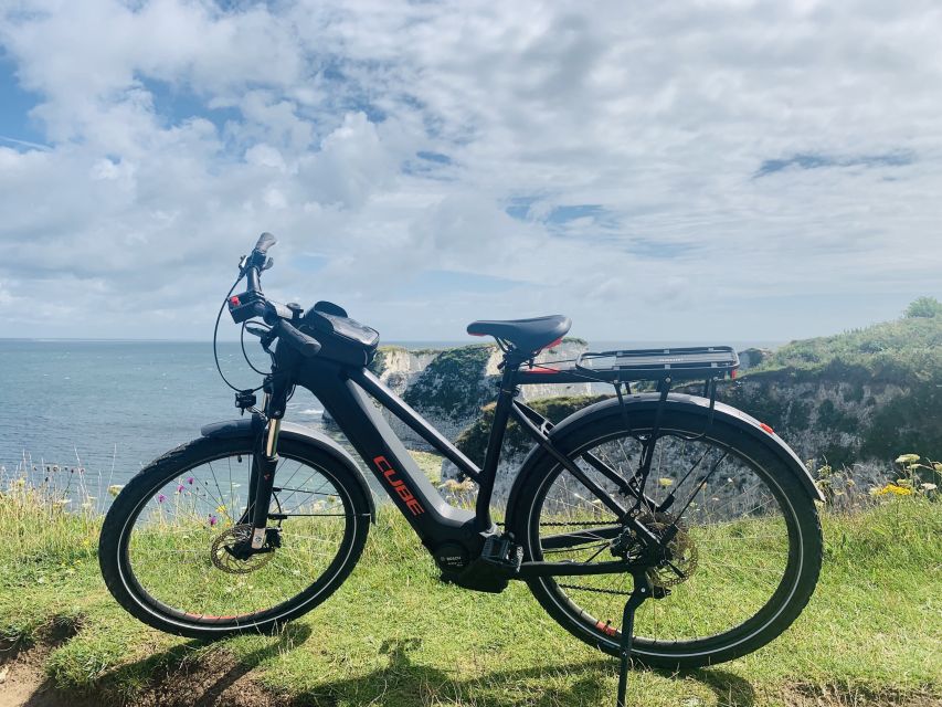 Poole: Old Harry Rocks and Corfé Castle Guided E-bike Tour - Highlights: Agllestone Rock