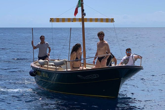 Tour in a Typical Boat of Capri at Sunset (2 Hours) - Meeting and Pickup