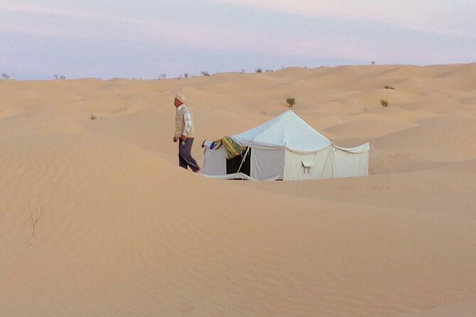 2 Days Tour to Douz & Ksar Ghilan Oasis. and an Overnight in the Sahara Under Bedouin Tent .. Dinner in the Camp, Private Jeep - With English Speaking Guide. - Explore Douz and Ksar Ghilan Oasis