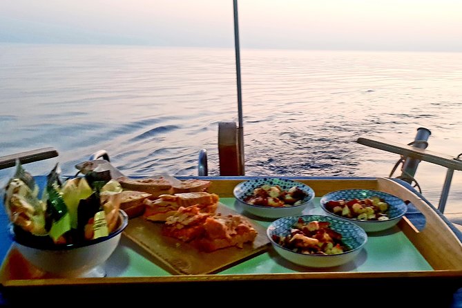 Boat Trip at Sunset + Bottle of Cava + Seafood Tapa - Weather Considerations