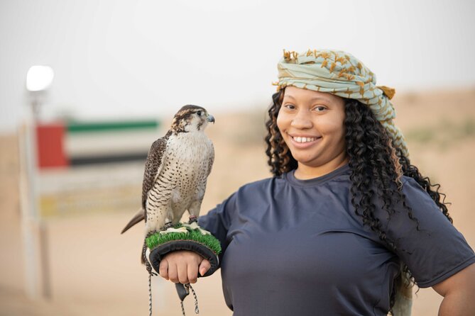 Dubai Half-Day Red Dunes Bashing With Sandboarding, Camel &Falcon - Camel Ride Encounter