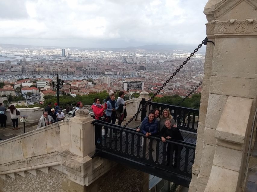 Marseille: Private City Center Walking Tour With Cruise - Snorkeling in Crystal-Clear Waters