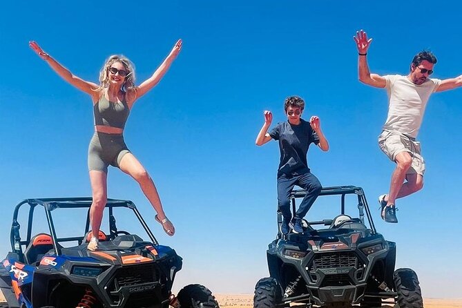 Polaris Dune Buggy Ride on Open Red Dunes Dubai - Sandboarding and Camel Riding