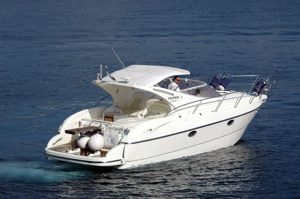 Santorini: Private Yacht Cruise With Open Bar and Meal - Accessibility and Cancellation