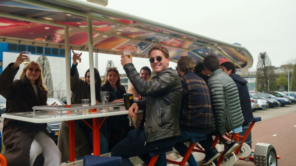 Amsterdam: Dutch Beer Bike Blast Tour With Onboard Bar - Key Points