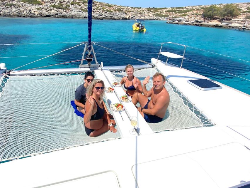 Chania: Private Day Catamaran Cruise With Swimming and Meal - Key Points