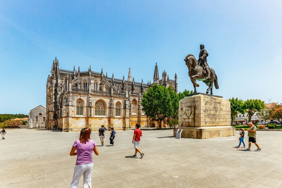 From Lisbon: Fatima, Obidos, Batalha and Nazaré Group Tour - Key Points