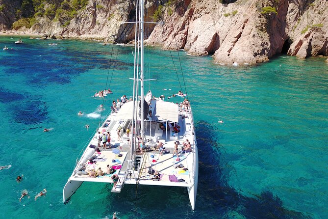 Sailing Along the Costa Brava in a Large Catamaran With a Buffet-Barbecue and Swimming Inlet. Drinks Are Included. - Key Points