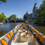 Amsterdam: Canal Cruise In German With Unlimited Drinks Tour Overview And Pricing