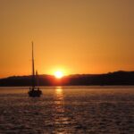 Cascais: Sunset Boat Trip With Welcome Drinks Activity Overview