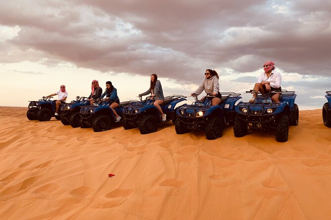 Dubai Red Dunes Quad Bike Safari, Camels, Sandsurf & Refreshment - Tour Details