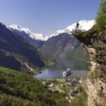 Geiranger: Bus Tour With Multilingual Audio Guide Tour Overview