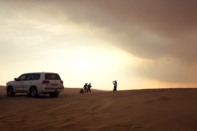 Doha: Desert Safari With Quad Bike ,Camel Ride and Sand Boarding - Dune Bashing and Quad Biking