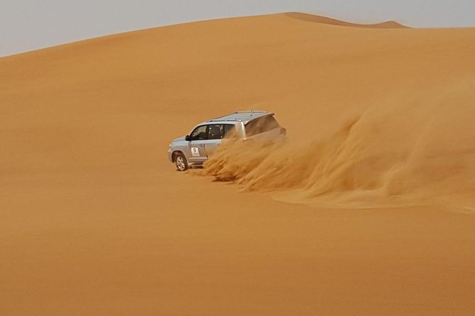 Sunrise Early Morning Desert Safari With Refreshments - Sandboarding Experience