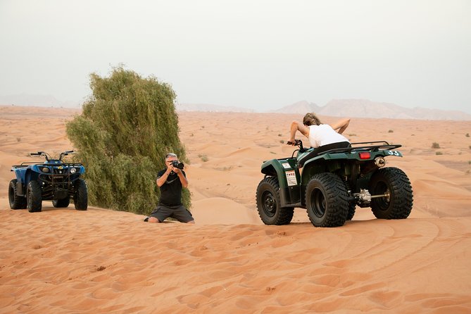 Dubai Red Dunes Quad Bike Safari, Camels, Sandsurf & Refreshment - Pickup and Transportation