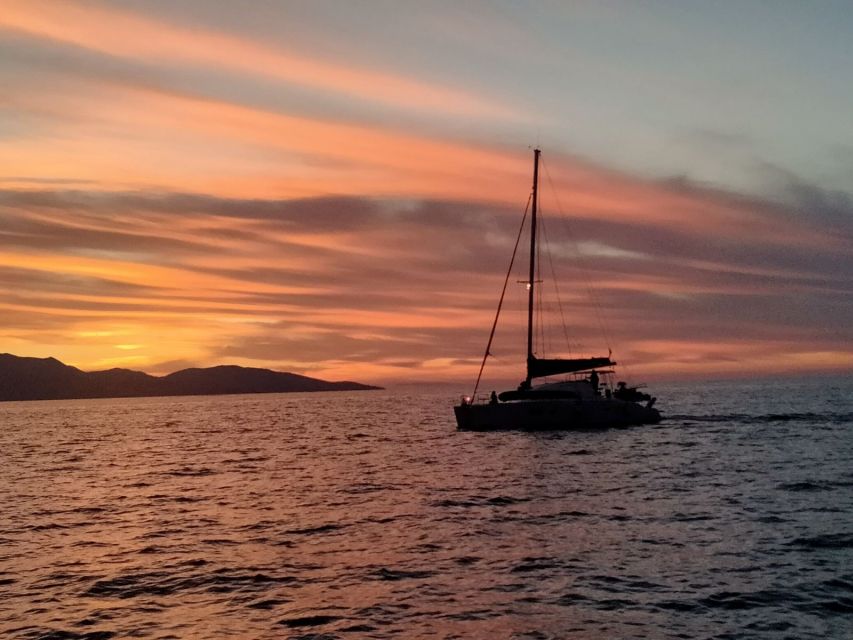 Hersonissos: Sunset Private Catamaran to St George Bay - Onboard Experience