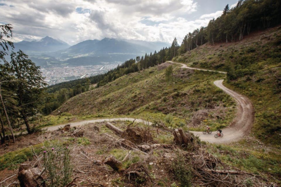 Innsbruck: Arzler Alm Single Trail E-bike Tour - Guided Tour Features