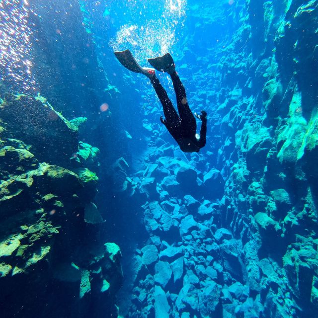 From Reykjavik: Silfra Snorkeling With Underwater Photos - Pristine Aquamarine Waters and Visibility