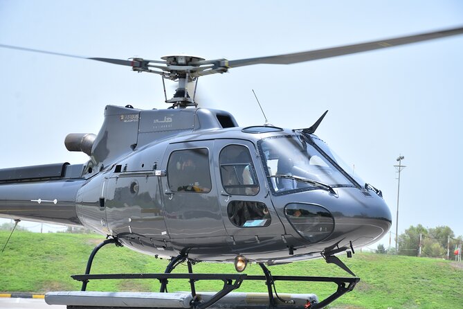 Dubai Helicopter Tour: Experience Dubai's Iconic Landmarks - Meeting Point and Transportation