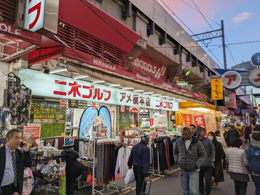 Tokyo Japanese Food Hopping Tour in Ueno Ameyoko at Night - Local Guide and Atmosphere