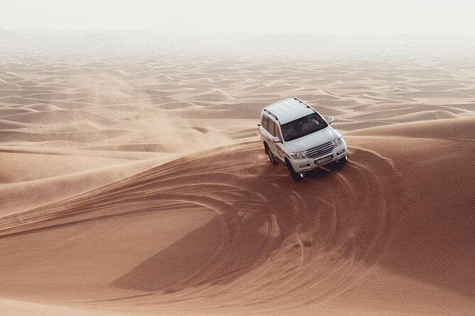 Dubia 4x4 Dune Bashing, Sandboarding, Camel Riding and Bbq Dinner - Key Points