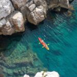 Old Town Walls To Betina Cave Beach Kayak Tour Tour Overview