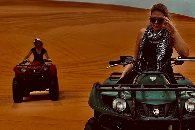 ATV Quad Bike Self-drive In Open Desert With BBQ Dinner And Live Shows - Camel Ride and Sand Boarding