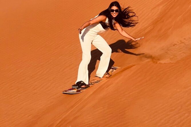 Dubai Desert Safari, Sand-boarding, CamelRide, Veg & BBQ Dinner - Dune Bashing and Sand Boarding