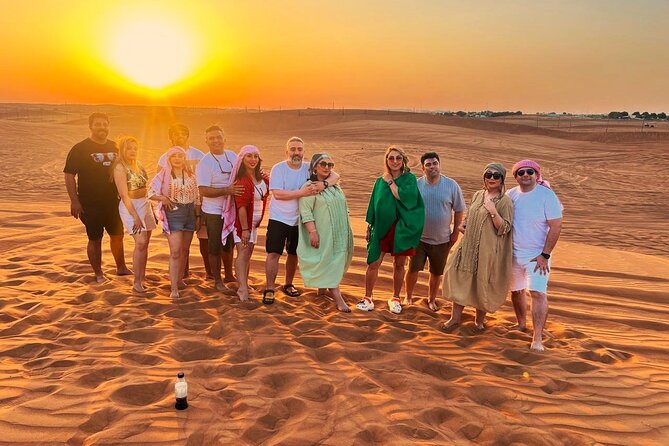 Dubai Desert Safari With BBQ Dinner Pickup From Ras Al Khaimah - Camel Ride and Henna Painting