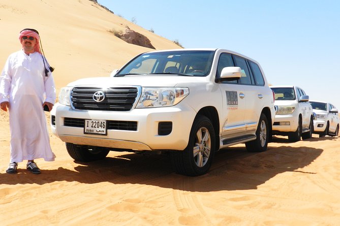 Dubai Desert Safari With Camels, Quadbike, Sandboarding & BBQ - Transportation and Pickup