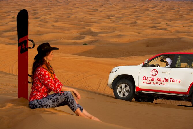 High Red Dunes With Camel Ride, Sandboarding, Falcon Show and VIP BBQ Dinner - Thrilling Dune Bashing