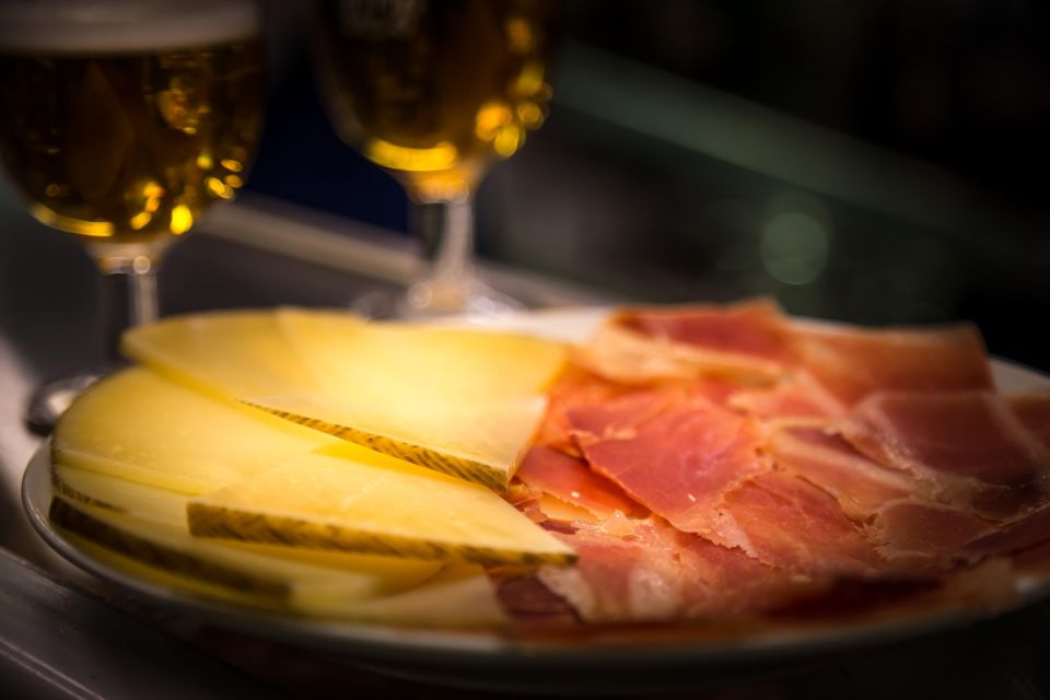 Madrid: Authentic Tapas Evening Tour With a Side of History - Experience and Itinerary