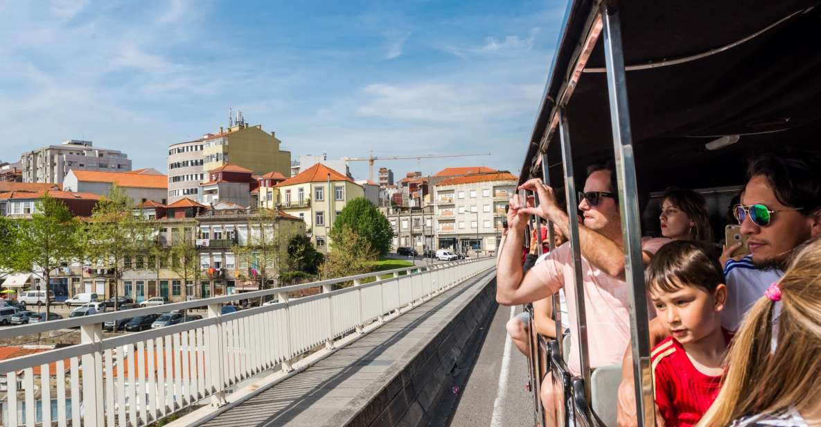 Porto: City Train Tour, River Cruise & Wine Cellar - Experience Highlights