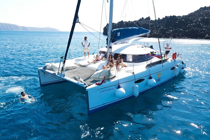 Best of Santorini Private Half-Day Catamaran Cruise With Transfer and Meal - Swimming and Photographic Opportunities