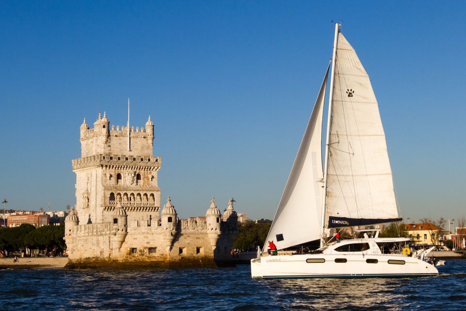 Lisbon: Sunset Catamaran Cruise, Drink, and Music - Lisbons Historical Monuments