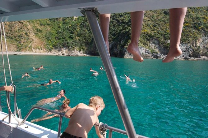 Ponza Island 5 Hr Boat Excursion With Swimming Stops and Lunch - Enjoying Lunch Onboard