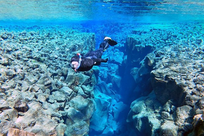 Silfra Wetsuit Snorkeling Tour With Underwater Photos - From Reykjavik - Snorkeling Equipment and Gear Provided