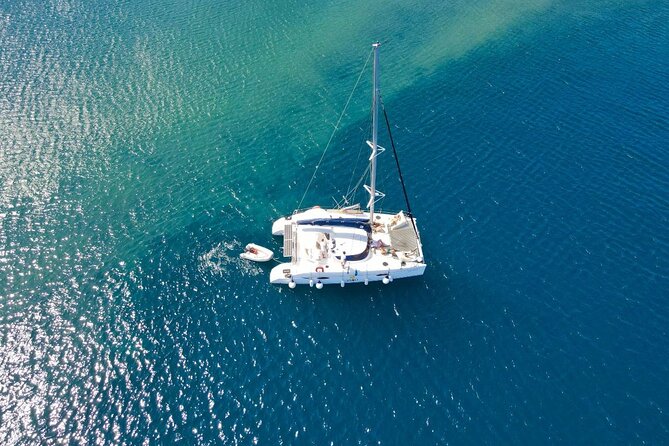 Best of Santorini Private Half-Day Catamaran Cruise With Transfer and Meal - Savoring Lunch or Dinner at Sea