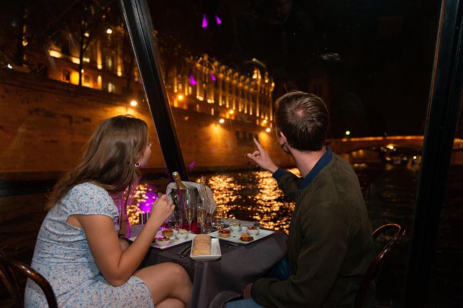 Paris Seine River Dinner Cruise With Champagne and Window Seating - Champagne and Flower Petal Ambiance