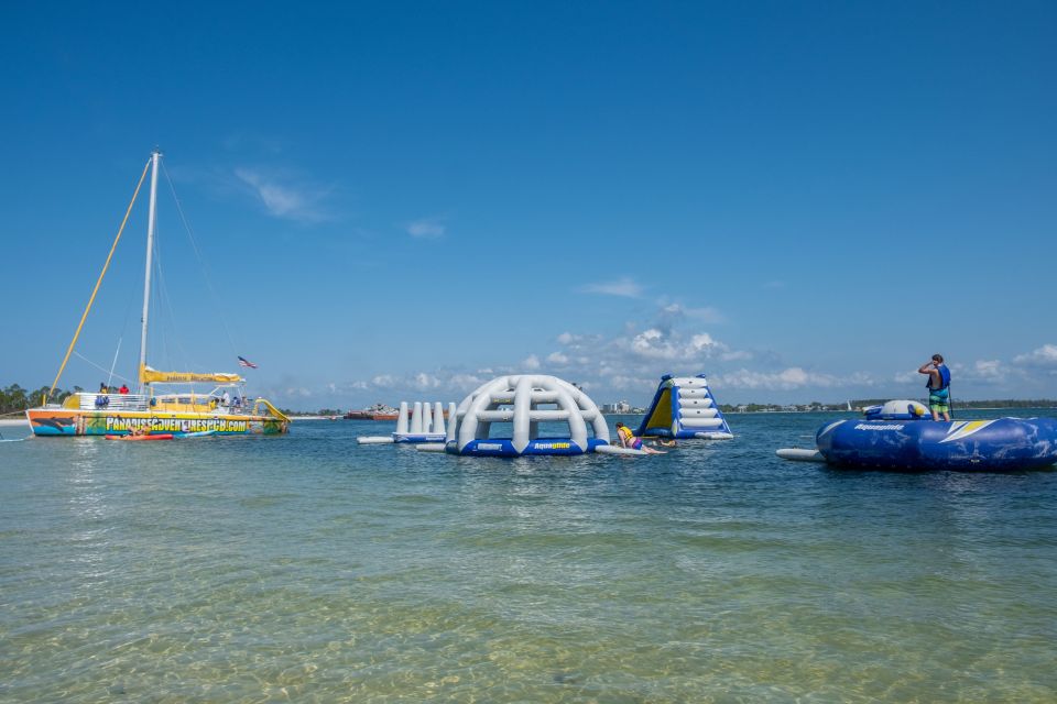 Shell Island: Water Park and Dolphin Watching Boat Trip - Dolphin Watching Experience