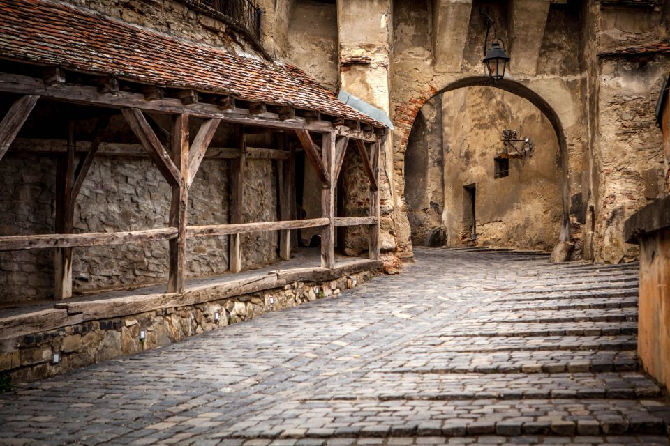 Sighisoara: Candlelight Tour of Draculas Home Town - Covered Stairs and Scholars Stairs