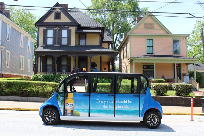 90-Minute Guided Sightseeing Tour by E-Car or MiniBus - Neighborhoods Explored