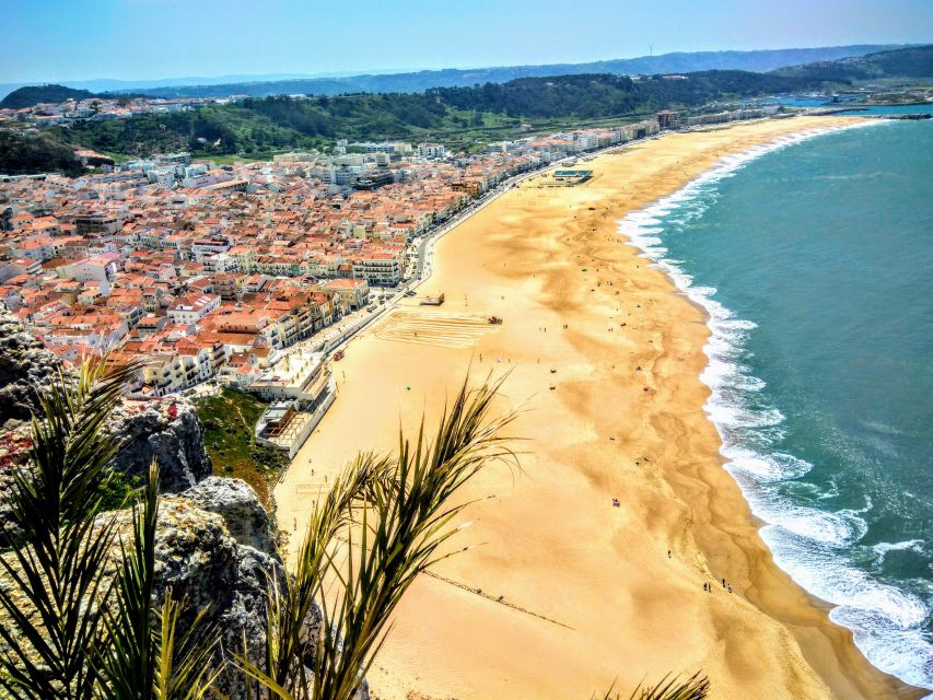 Lisbon: Obidos Medieval Village World Heritage Private Tour - Strolling Nazares Sandy Beach